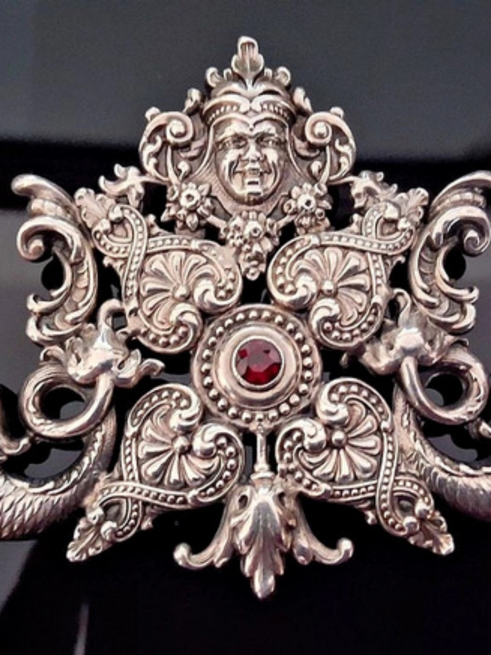 Antique sterling silver ornate brooch w/garnet Mermaids, dolphins,mascaron
